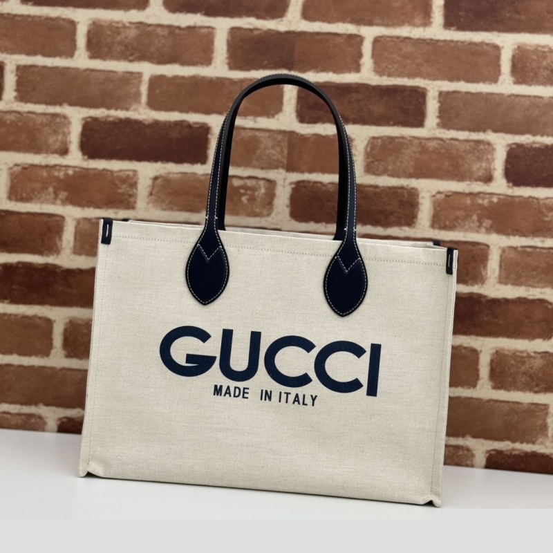 G*u*i shopping bags